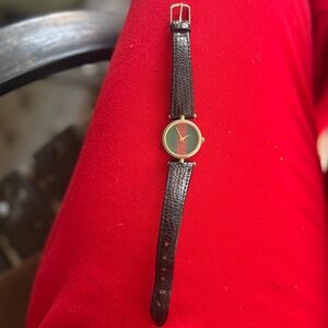 Vintage Gucci Black Leather Watch with Gold Trim